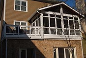 Gabled porch with transoms and white Deckorator rail