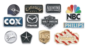 Die struck emblem samples.  There is no
set-up charge for repeat orders, however the minimum for doing emblems is 24 units.  Call us to
discuss 1st time discounted tooling charge for die struck or silk-screen emblems